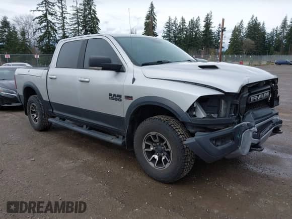 2018 Ram 1500 Rebel with VIN 1C6RR7YT5JS152633, listed as a IAAI auction lot 41788274 with 146,298 mi miles and . Bid and sale history available at DreamBid. Image 1.