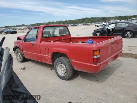 1989 Dodge RAM with VIN JB7FL24D3KP057796, listed as a Copart auction lot 72959134 with Not provided miles and Salvage title. Bid and sale history available at DreamBid. Image 2.