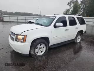 2013 Chevrolet Tahoe LT with VIN 1GNSCBE04DR319186, listed as a Copart auction lot 81827285 with 169,473 mi miles and Salvage title. Bid and sale history available at DreamBid. Image 1.