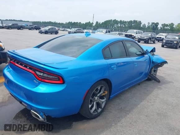 2015 Dodge Charger RT z VIN 2C3CDXCT4FH862551, wystawiony jako IAAI lot #43019039 z przebiegiem 125 655 mil mil oraz . Historia ofert i sprzedaży dostępna na DreamBid. Obrazek 4.