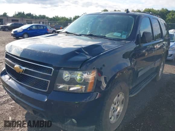 2012 Chevrolet Tahoe LT z VIN 1GNSKBE07CR159175, wystawiony jako IAAI lot #43061685 z przebiegiem 251 378 mil mil oraz . Historia ofert i sprzedaży dostępna na DreamBid. Obrazek 6.
