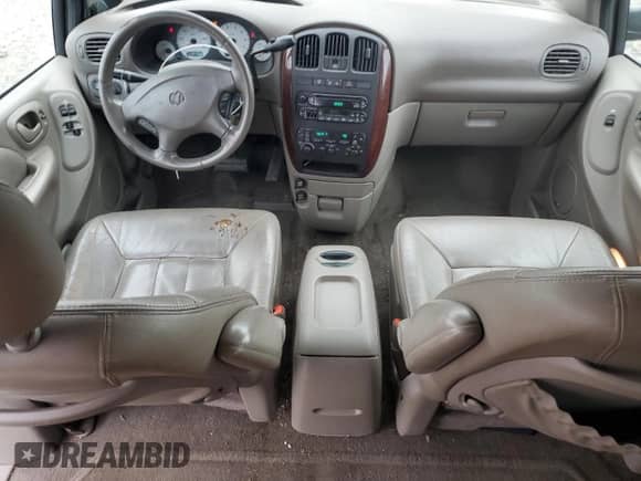 2001 Dodge Caravan ES with VIN 2B8GP54L01R117432, listed as a Copart auction lot 84896924 with 207,991 mi miles and Salvage title. Bid and sale history available at DreamBid. Image 8.