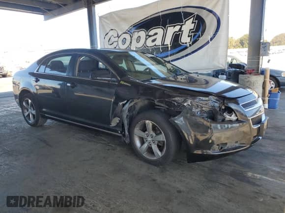 2009 Chevrolet Malibu Hybrid с VIN 1G1ZF57529F129722, выставлен на аукционе Copart как лот 69473585 с пробегом 79 097 миль миль и Списание • Salvage title. История ставок и продаж доступна на DreamBid. Изображение 4.