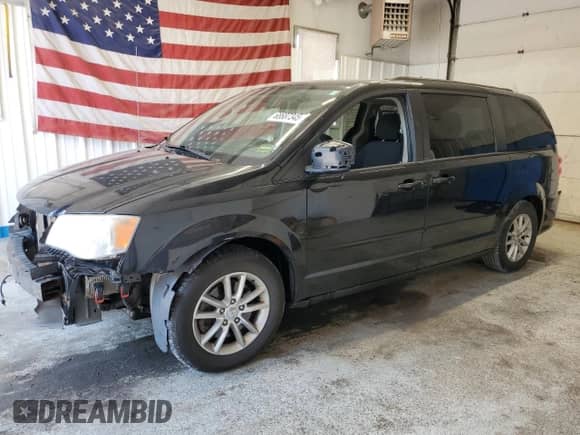 2013 Dodge Grand Caravan SXT with VIN 2C4RDGCGXDR718759, listed as a Copart auction lot 68687345 with 196,834 mi miles and Salvage title. Bid and sale history available at DreamBid. Image 1.
