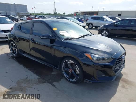 2019 Hyundai Veloster Turbo R-Spec z VIN KMHTH6AB1KU006986, wystawiony jako IAAI lot #42052689 z przebiegiem 92 317 mil mil oraz . Historia ofert i sprzedaży dostępna na DreamBid. Obrazek 1.