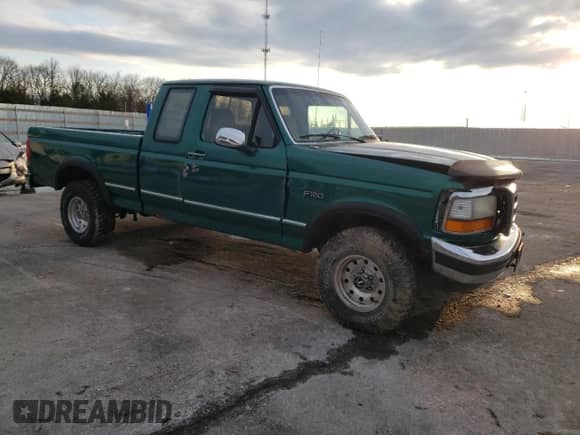 1996 Ford F-150 with VIN 1FTEX14N8TKA40042, listed as a Copart auction lot 88220235 with 190,784 mi miles and Salvage title. Bid and sale history available at DreamBid. Image 4.