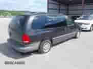 1999 Dodge Grand Caravan with VIN 1B4GP54GXXB897614, listed as a IAAI auction lot 42141997 with 157,698 mi miles and . Bid and sale history available at DreamBid. Image 4.