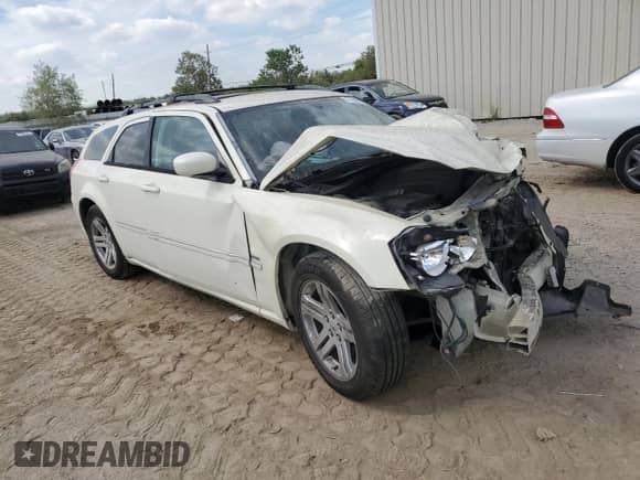 2005 Dodge Magnum RT with VIN 2D8GV582X5H682716, listed as a Copart auction lot 77242904 with 251,158 mi miles and Salvage title. Bid and sale history available at DreamBid. Image 4.