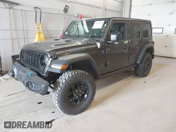 2024 Jeep Wrangler Sport S with VIN 1C4RJXN67RW310263, listed as a IAAI auction lot 42810399 with 6,804 mi miles and . Bid and sale history available at DreamBid. Image 2.
