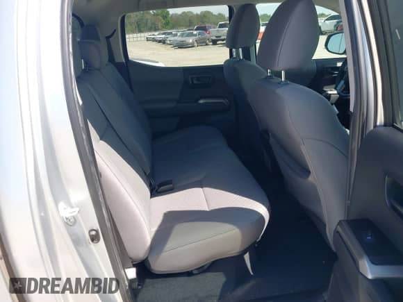 2022 Toyota Tacoma SR z VIN 3TYCZ5AN3NT091901, wystawiony jako IAAI lot #43203869 z przebiegiem 29 572 mil mil oraz . Historia ofert i sprzedaży dostępna na DreamBid. Obrazek 8.