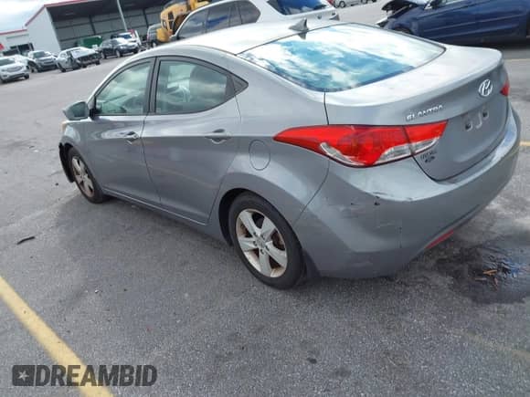 2013 Hyundai Elantra GLS z VIN KMHDH4AE9DU523071, wystawiony jako IAAI lot #43586642 z przebiegiem 176 733 mil mil oraz . Historia ofert i sprzedaży dostępna na DreamBid. Obrazek 3.