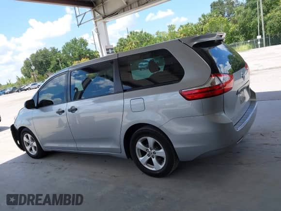 2015 Toyota Sienna L with VIN 5TDZK3DCXFS607178, listed as a IAAI auction lot 42868518 with 318,805 mi miles and . Bid and sale history available at DreamBid. Image 14.