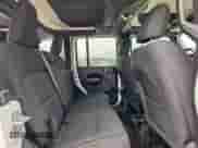 2023 Jeep Wrangler Sport S with VIN 1C4HJXDN3PW682572, listed as a Copart auction lot 68643135 with 14,621 mi miles and Salvage title. Bid and sale history available at DreamBid. Image 11.