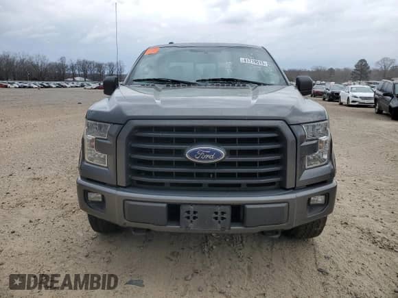 2015 Ford F-150 XLT z VIN 1FTEX1EP0FFC63401, wystawiony jako Copart lot #41719513 z przebiegiem 129 618 mil mil oraz Szkoda całkowita • Salvage title. Historia ofert i sprzedaży dostępna na DreamBid. Obrazek 5.