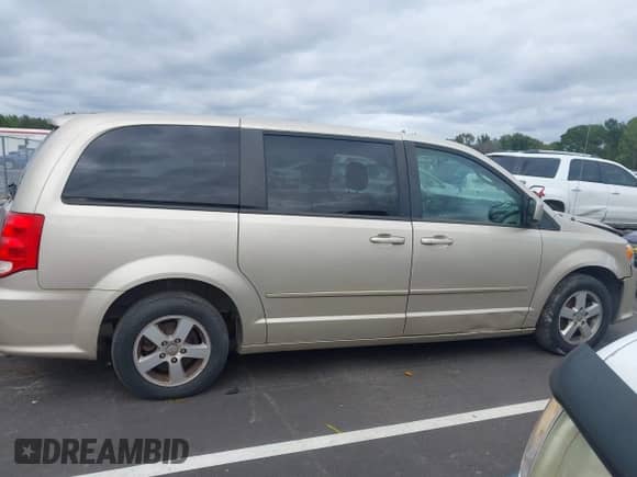 2012 Dodge Grand Caravan SXT z VIN 2C4RDGCG1CR399332, wystawiony jako IAAI lot #43444930 z przebiegiem 151 325 mil mil oraz . Historia ofert i sprzedaży dostępna na DreamBid. Obrazek 13.