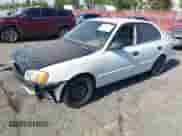 2002 Hyundai Accent GL z VIN KMHCG45C42U375352, wystawiony jako IAAI lot #42699297 z przebiegiem 103 540 mil mil oraz . Historia ofert i sprzedaży dostępna na DreamBid. Obrazek 2.