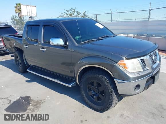 2009 Nissan Frontier SE with VIN 1N6AD07W49C403281, listed as a IAAI auction lot 42758532 with 198,273 mi miles and . Bid and sale history available at DreamBid. Image 1.