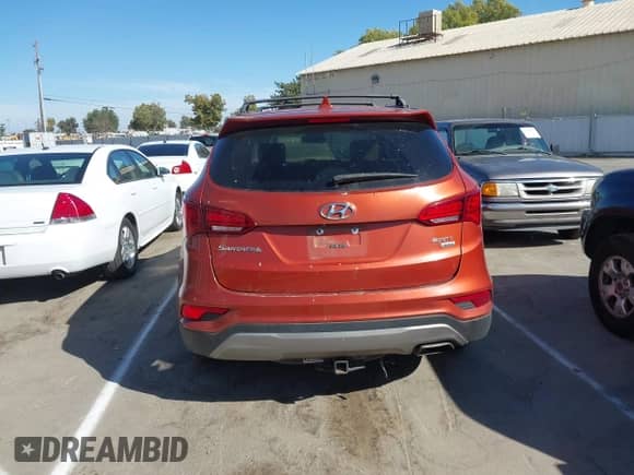 2017 Hyundai Santa Fe 2.4L z VIN 5XYZTDLB1HG443833, wystawiony jako IAAI lot #42908168 z przebiegiem 137 312 mil mil oraz . Historia ofert i sprzedaży dostępna na DreamBid. Obrazek 16.