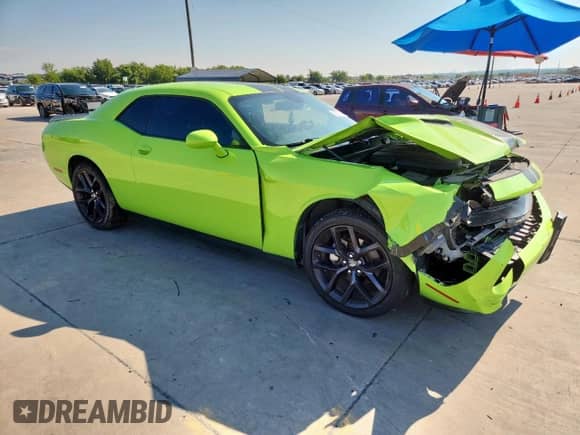 2023 Dodge Challenger SXT with VIN 2C3CDZAG3PH554144, listed as a Copart auction lot 70311265 with 55,494 mi miles and Salvage title. Bid and sale history available at DreamBid. Image 4.