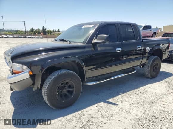 2001 Dodge Dakota Sport with VIN 1B7HG2AN51S234242, listed as a Copart auction lot 66702055 with 201,466 mi miles and Salvage title. Bid and sale history available at DreamBid. Image 1.