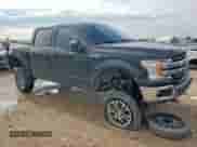 2019 Ford F-150 XL with VIN 1FTEW1E57KKD15481, listed as a Copart auction lot 69432485 with 107,956 mi miles and Salvage title. Bid and sale history available at DreamBid. Image 4.