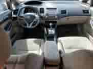 2010 Honda Civic with VIN 19FXA1F8XAE019092, listed as a Copart auction lot 71496354 with 185,077 mi miles and Salvage title. Bid and sale history available at DreamBid. Image 8.