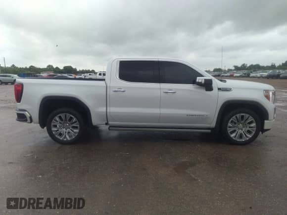 2022 GMC Sierra 1500 Denali z VIN 3GTP8FED5NG185252, wystawiony jako IAAI lot #42204861 z przebiegiem 55 608 mil mil oraz . Historia ofert i sprzedaży dostępna na DreamBid. Obrazek 13.