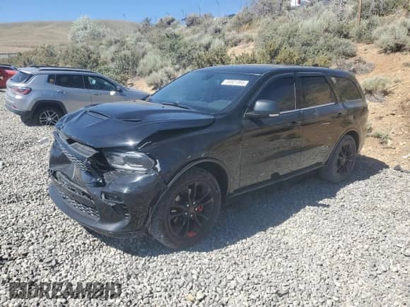 2020 Dodge Durango R/T with VIN 1C4SDHCT0LC394328, listed as a Copart auction lot 60821955 with 70,504 mi miles and Salvage title. Bid and sale history available at DreamBid. Image 1.