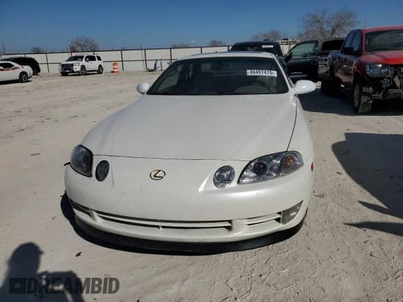 1992 Lexus SC 400 with VIN JT8UZ30C0N0015980, listed as a Copart auction lot 46407475 with 135,304 mi miles and Salvage title. Bid and sale history available at DreamBid. Image 5.