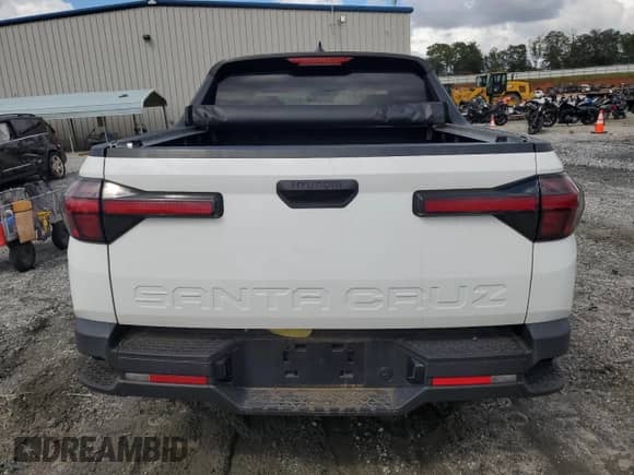 2022 Hyundai Santa Cruz SEL с VIN 5NTJB4AE2NH031777, выставлен на аукционе Copart как лот 68491795 с пробегом 38 141 миль миль и Списание • Salvage title. История ставок и продаж доступна на DreamBid. Изображение 6.