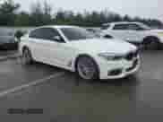 2020 BMW 5 Series M550i xDrive with VIN WBAJS7C03LBN96746, listed as a Copart auction lot 63870085 with Not provided miles and Salvage title. Bid and sale history available at DreamBid. Image 4.