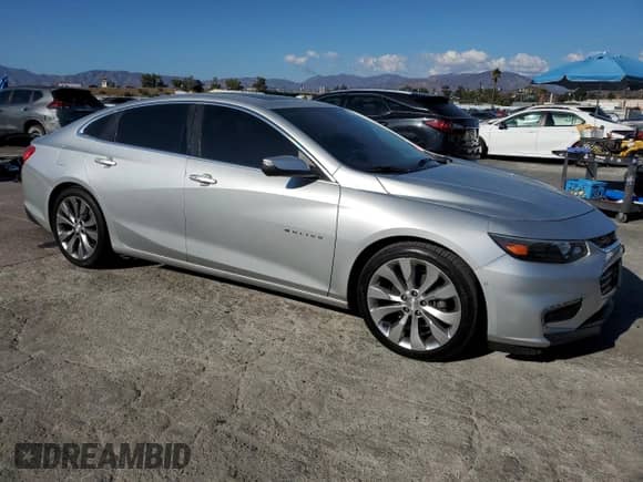 2016 Chevrolet Malibu Premier with VIN 1G1ZH5SX2GF261556, listed as a Copart auction lot 81658285 with 143,368 mi miles and Salvage title. Bid and sale history available at DreamBid. Image 4.