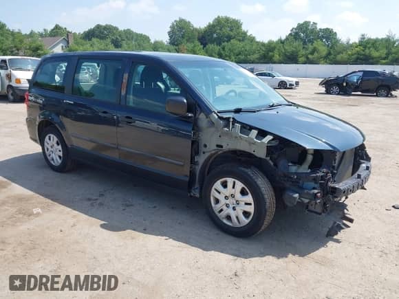 2014 Dodge Grand Caravan SE with VIN 2C4RDGBG7ER248080, listed as a IAAI auction lot 42683662 with 128,616 mi miles and . Bid and sale history available at DreamBid. Image 1.