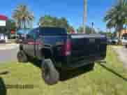 2009 GMC Sierra 1500 z VIN 2GTEC290291129595, wystawiony jako Copart lot #90131885 z przebiegiem 124 544 mil mil oraz Czysty tytuł • Clean title. Historia ofert i sprzedaży dostępna na DreamBid. Obrazek 3.