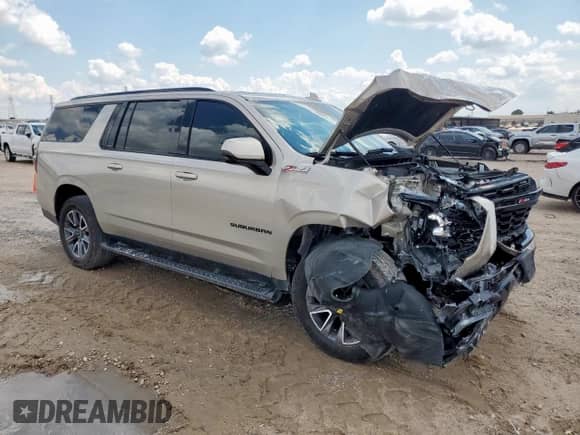 2024 Chevrolet Suburban Z71 с VIN 1GNSKDKD1RR167056, выставлен на аукционе Copart как лот 71081435 с пробегом 26 410 миль миль и Списание • Salvage title. История ставок и продаж доступна на DreamBid. Изображение 4.