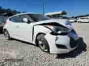 2013 Hyundai Veloster w/Gray Int z VIN KMHTC6AD4DU146162, wystawiony jako Copart lot #84929175 z przebiegiem 143 947 mil mil oraz Szkoda całkowita • Salvage title. Historia ofert i sprzedaży dostępna na DreamBid. Obrazek 4.