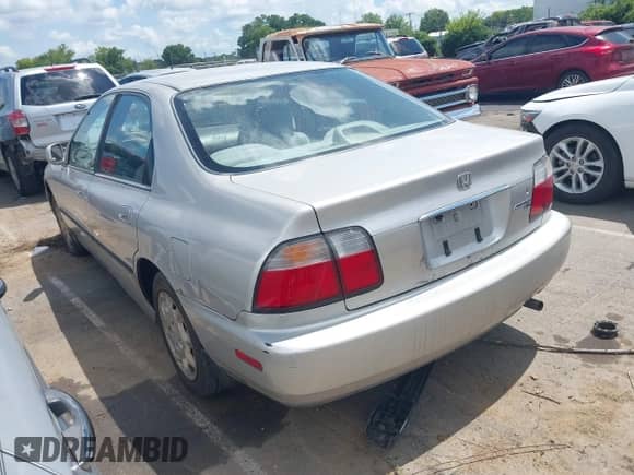 1996 Honda Accord LX with VIN 1HGCD5630TA172402, listed as a IAAI auction lot 42758297 with 209,914 mi miles and . Bid and sale history available at DreamBid. Image 3.