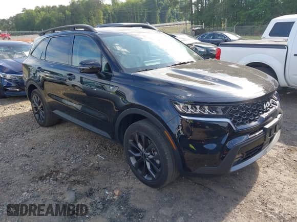 2023 Kia Sorento X-Line EX with VIN 5XYRHDLF6PG218987, listed as a IAAI auction lot 42202644 with 24,475 mi miles and . Bid and sale history available at DreamBid. Image 1.