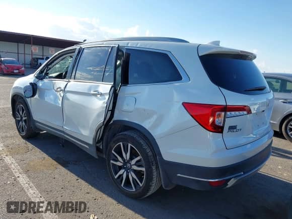 2021 Honda Pilot Elite с VIN 5FNYF6H00MB095515, выставлен на аукционе IAAI как лот 43178580 с пробегом Не указан миль и . История ставок и продаж доступна на DreamBid. Изображение 3.