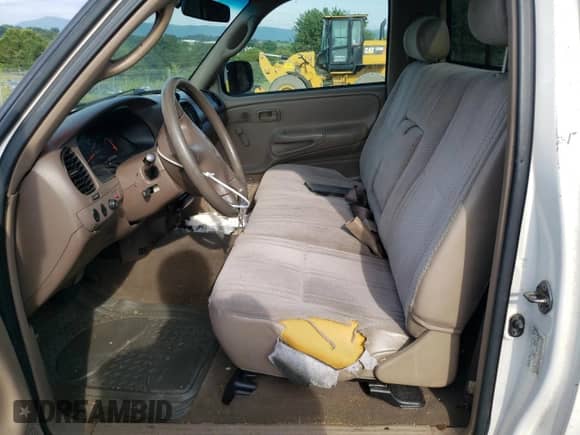 2002 Toyota Tundra z VIN 5TBJN32112S221774, wystawiony jako Copart lot #68450155 z przebiegiem 490 065 mil mil oraz Szkoda całkowita • Salvage title. Historia ofert i sprzedaży dostępna na DreamBid. Obrazek 7.