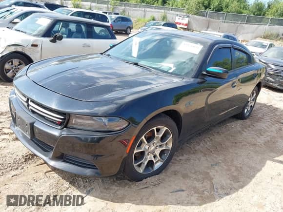 2015 Dodge Charger SE z VIN 2C3CDXFG0FH748867, wystawiony jako IAAI lot #42971634 z przebiegiem 122 520 mil mil oraz . Historia ofert i sprzedaży dostępna na DreamBid. Obrazek 2.