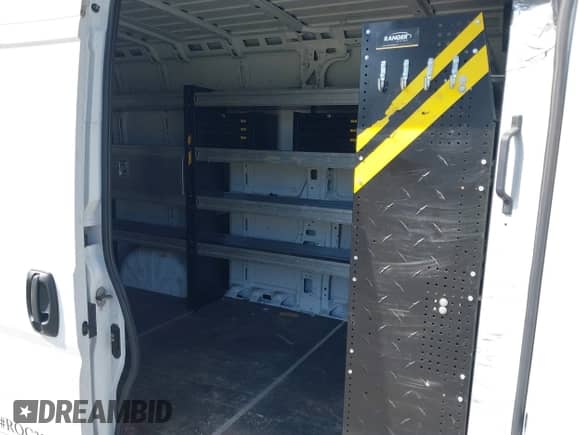 2023 Ram ProMaster Cargo z VIN 3C6MRVJG7PE536680, wystawiony jako IAAI lot #42044422 z przebiegiem 43 424 mil mil oraz . Historia ofert i sprzedaży dostępna na DreamBid. Obrazek 8.