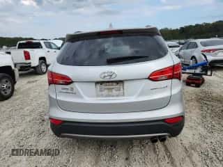 2014 Hyundai Santa Fe z VIN 5XYZU3LAXEG166061, wystawiony jako Copart lot #85856605 z przebiegiem 121 854 mil mil oraz Szkoda całkowita • Salvage title. Historia ofert i sprzedaży dostępna na DreamBid. Obrazek 6.