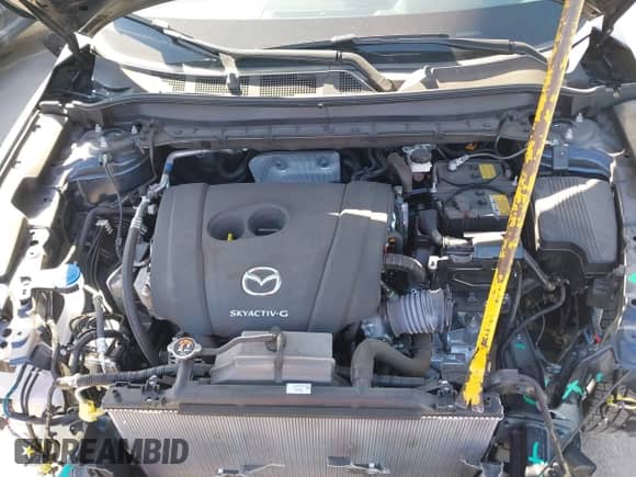 2024 Mazda CX-5 S Preferred with VIN JM3KFBCL6R0469915, listed as a IAAI auction lot 41730847 with 12,153 mi miles and . Bid and sale history available at DreamBid. Image 10.