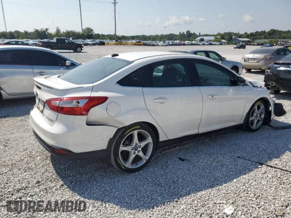 2013 Ford Focus Titanium z VIN 1FADP3J25DL168564, wystawiony jako Copart lot #80250465 z przebiegiem 111 505 mil mil oraz Szkoda całkowita • Salvage title. Historia ofert i sprzedaży dostępna na DreamBid. Obrazek 3.