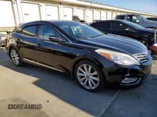 2013 Hyundai Azera с VIN KMHFH4JG2DA204770, выставлен на аукционе Copart как лот 82849384 с пробегом 88 246 миль миль и Списание • Salvage title. История ставок и продаж доступна на DreamBid. Изображение 4.