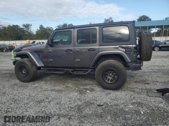 2022 Jeep Wrangler Unlimited Rubicon z VIN 1C4JJXFG6NW238566, wystawiony jako Copart lot #84026995 z przebiegiem 23 187 mil mil oraz Szkoda całkowita • Salvage title. Historia ofert i sprzedaży dostępna na DreamBid. Obrazek 2.