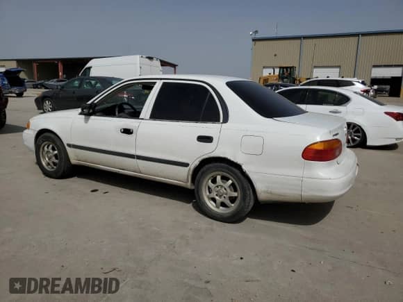 2002 Chevrolet Prizm z VIN 1Y1SK528X2Z409412, wystawiony jako Copart lot #47899055 z przebiegiem 99 262 mil mil oraz Czysty tytuł • Clean title. Historia ofert i sprzedaży dostępna na DreamBid. Obrazek 2.