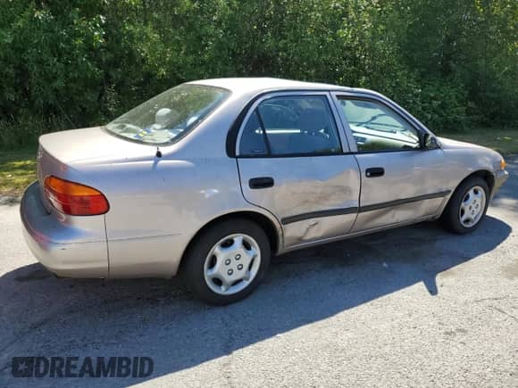 2000 Chevrolet Prizm с VIN 1Y1SK5283YZ412788, выставлен на аукционе Copart как лот 63516155 с пробегом Не указан миль и Списание • Salvage title. История ставок и продаж доступна на DreamBid. Изображение 3.