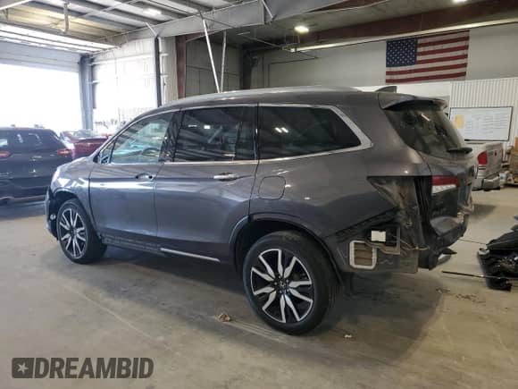 2021 Honda Pilot Touring 8-Passenger с VIN 5FNYF6H94MB034098, выставлен на аукционе Copart как лот 87397795 с пробегом 72 448 миль миль и Списание • Salvage title. История ставок и продаж доступна на DreamBid. Изображение 2.